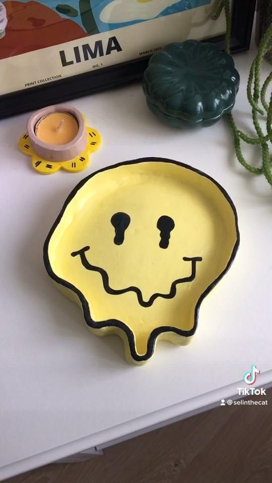 a yellow plate sitting on top of a table