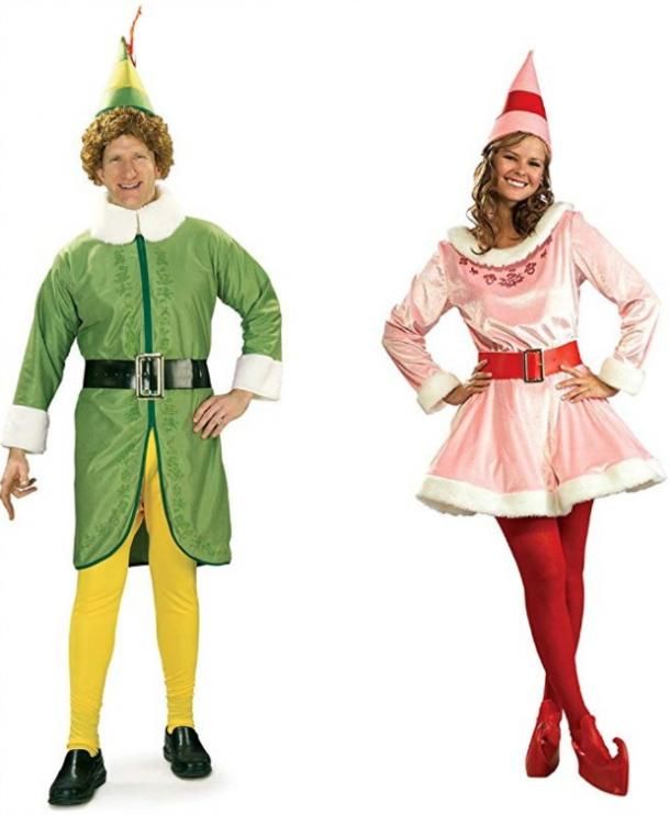 two people dressed in costumes standing next to each other, one wearing a green elf costume