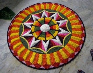 a person standing next to a colorful rug on the floor