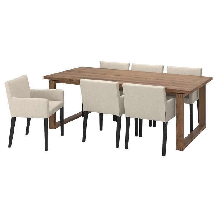 a dining table with six chairs around it