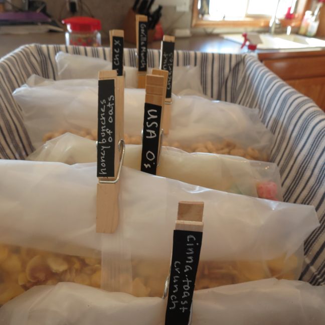 three bags of clothespin bag labels in a basket