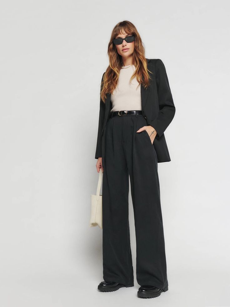 This look from Reformation is a whole vibe and I’m here for it! You can pretty much pair these trousers with anything. Dress them up with a blazer or down with an oversized sweatshirt and sneakers 👟 Workwear Day to Night Women’s fall fashion Fall outfit idea Minimalist wardrobe Blazer Black slacks Tailored pants Follow my shop @saltandsable on the @shop.LTK app to shop this post and get my exclusive app-only content! #liketkit #LTKworkwear #LTKstyletip @shop.ltk https://liketk.it/ Workwear 2023, Academia Summer Outfit, Mason Pant, Miranda Hobbes, Wide Leg Pants Outfit, Loafers Outfit, Wardrobe Planning, Women Office, Wide Pants