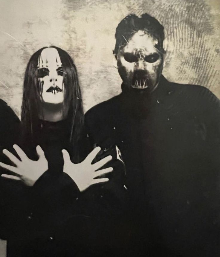 three people dressed up as zombies in black and white