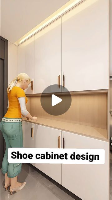 a woman standing in front of a kitchen counter top next to white cabinets and cupboards