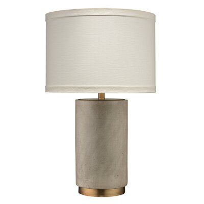 a table lamp with a white shade on it