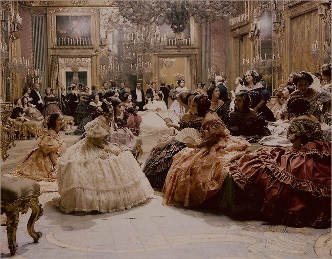 Countless ladies chitchatting in a ballroom, dressed in large hooped ballgowns 1800s Aesthetic, Era Victoria, Royalty Core, Royal Core, Fairytale Aesthetic, Medieval Aesthetic, Castle Aesthetic, Victorian Aesthetic, Queen Aesthetic