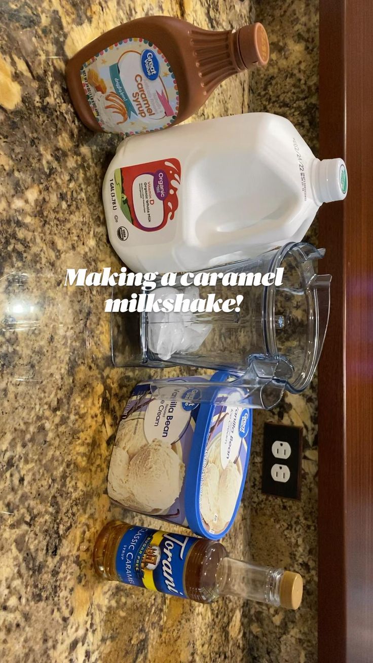 an assortment of food items sitting on top of a counter next to a bottle of milk