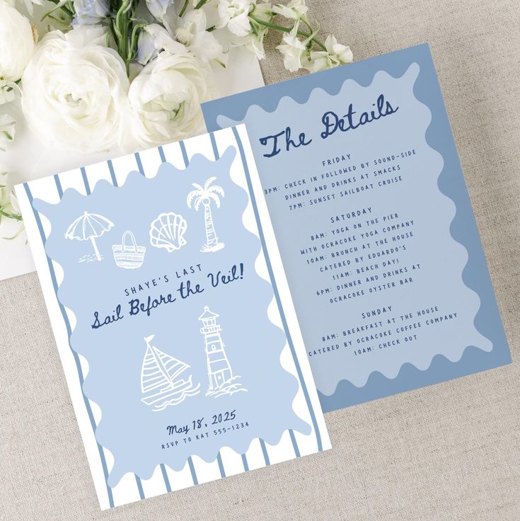 a blue and white wedding card with sailboats, lighthouses and umbrellas on it