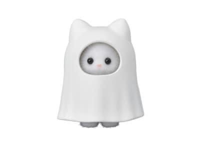 a white cat with black eyes and a cape