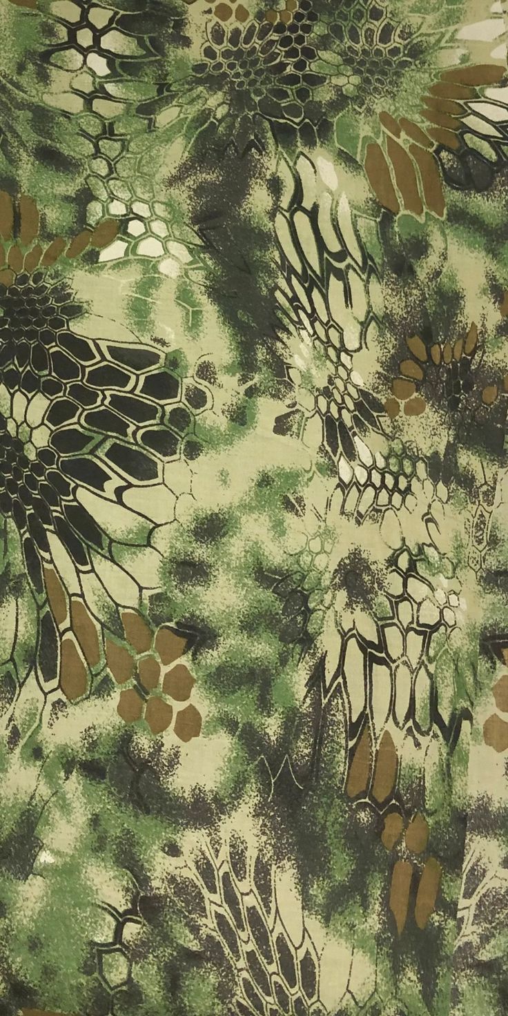 a green and brown floral print fabric