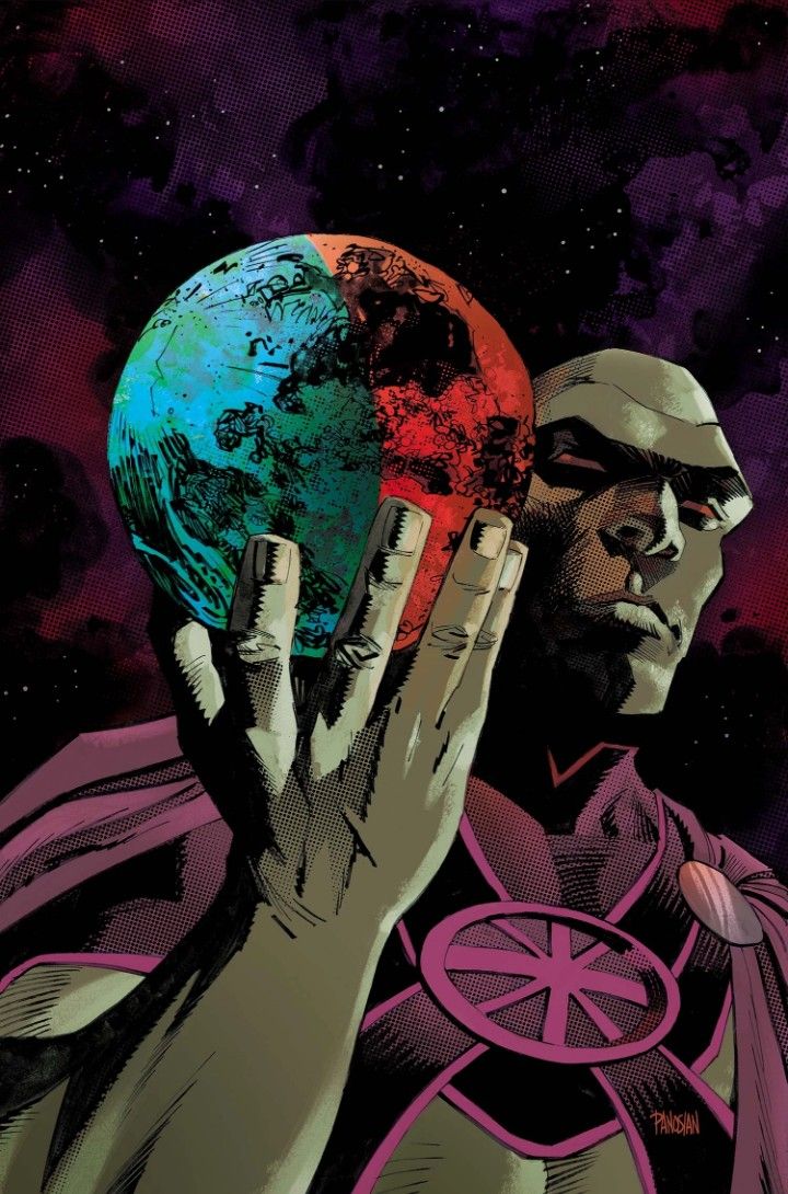 a man holding up a planet in his hands