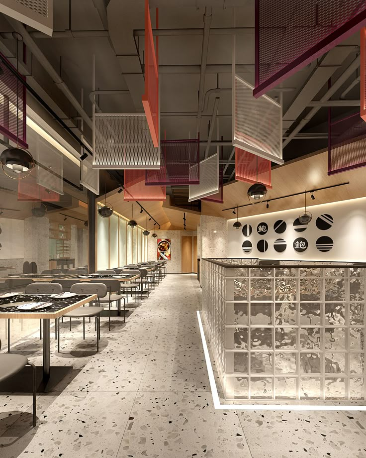 an empty restaurant with tables and benches in the center, along with lots of windows