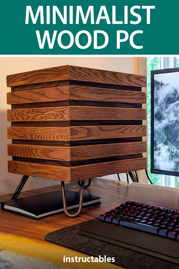 a wooden computer case sitting on top of a desk next to a keyboard and monitor