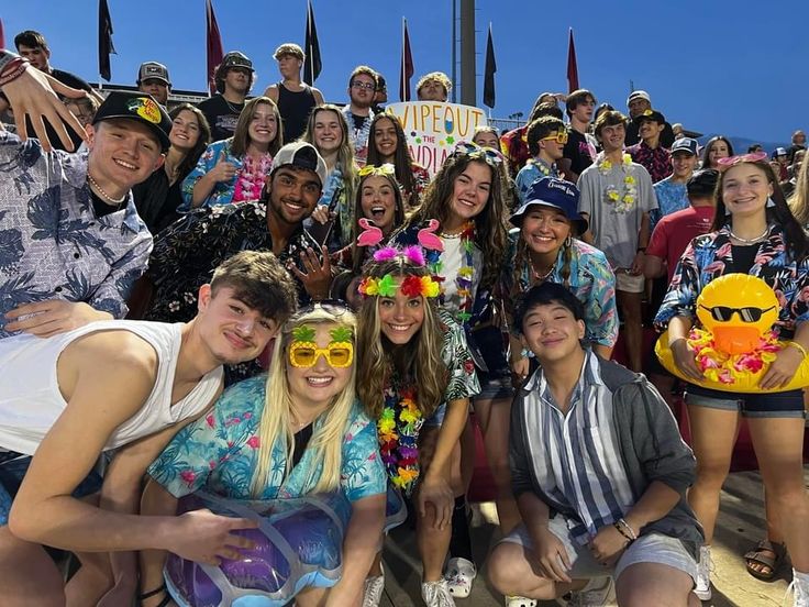 a group of young people posing for a photo