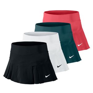 three women's tennis skirts with the nike logo on each side, all in different colors