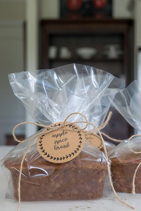 two pieces of bread wrapped in cellophane and tied with twine on top