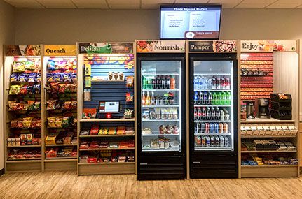 a grocery store filled with lots of vending machines