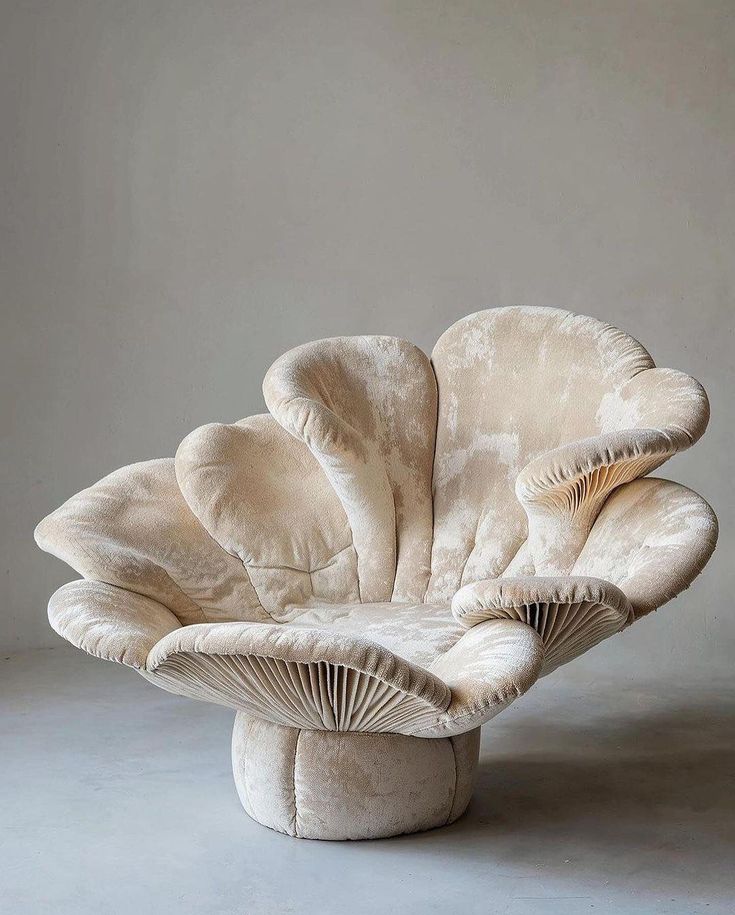 an unusual chair made out of fabric and wood is featured in the image, it appears to be mushroom like