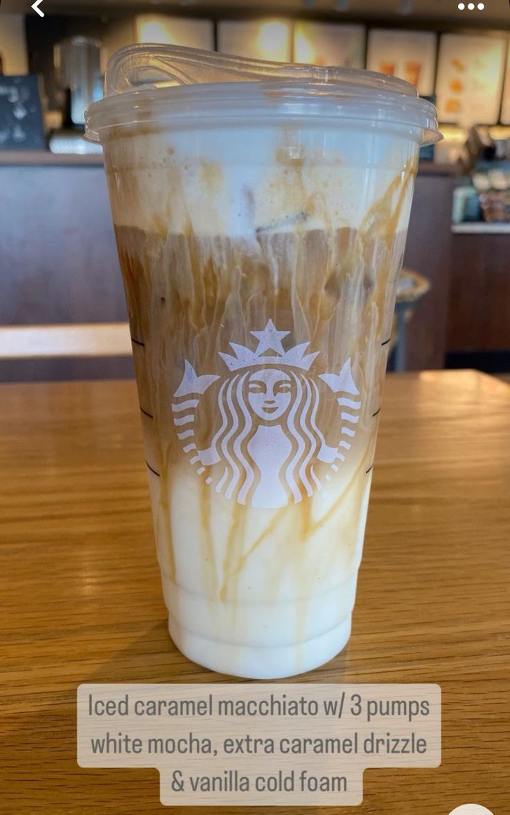 a starbucks drink with white mocha and caramel drizzle on the side