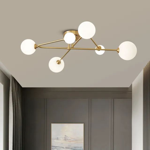 an image of a modern ceiling light in the living room with grey walls and carpet