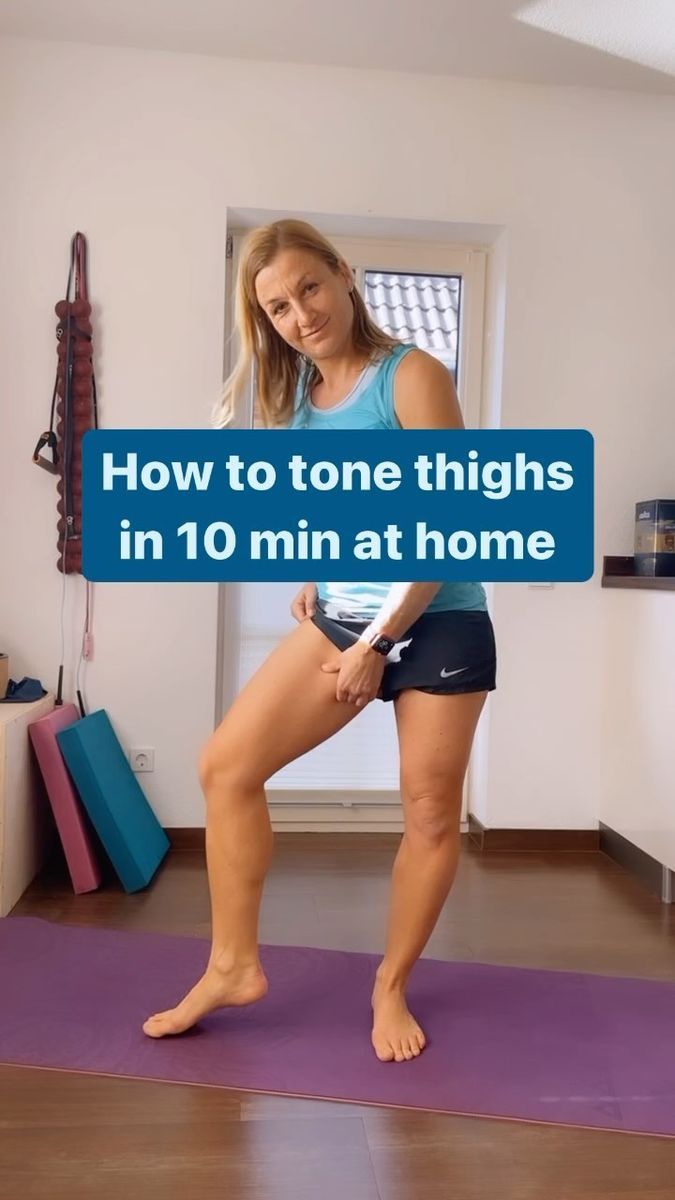 a woman standing on top of a purple mat in front of a window with the words how to tone thighs in 10 min at home