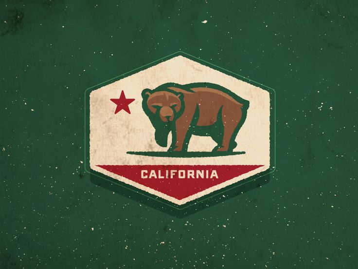 the california state emblem is painted on an old green and white hexagonal background