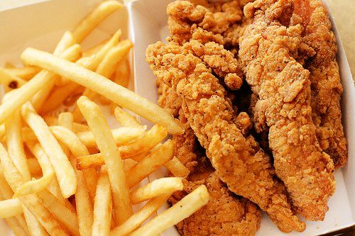 fried chicken and french fries in a box