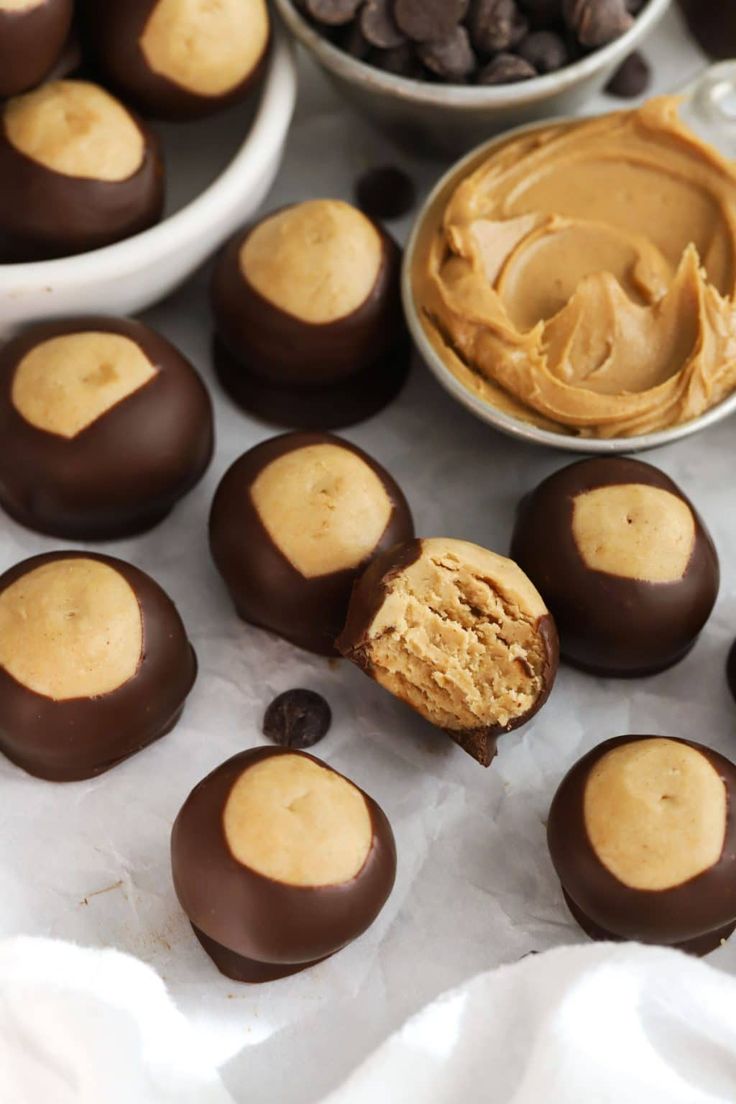 peanut butter balls and chocolate chips on a table