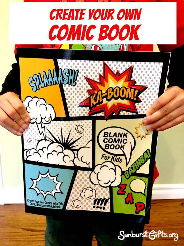 a person holding up a comic book with the title create your own comic book on it