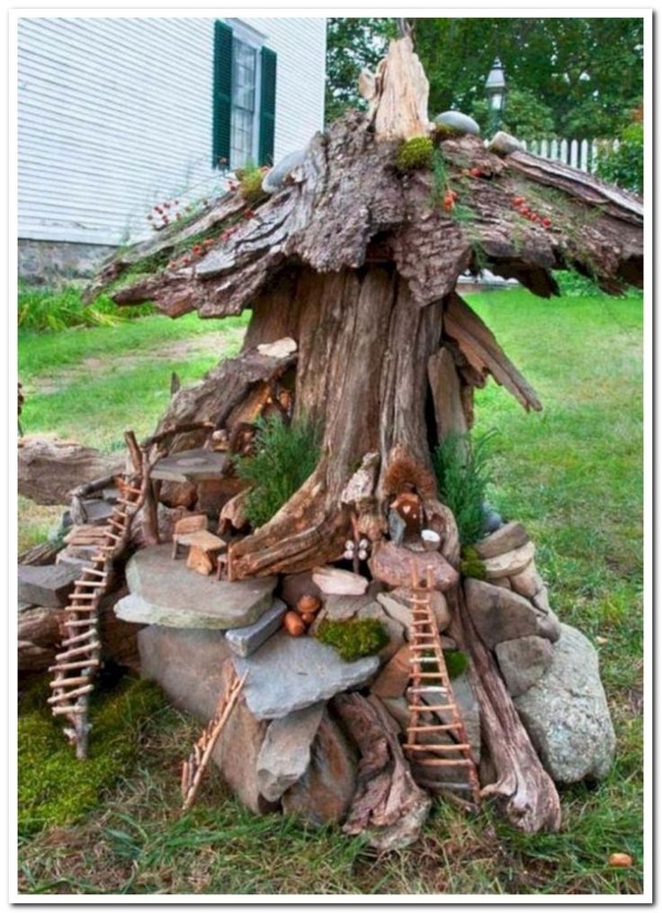 a tree stump that has been turned into a house