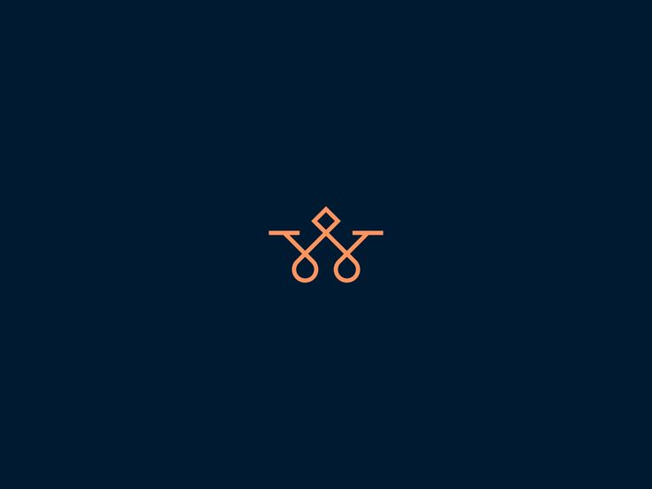 an orange and black logo on a dark blue background