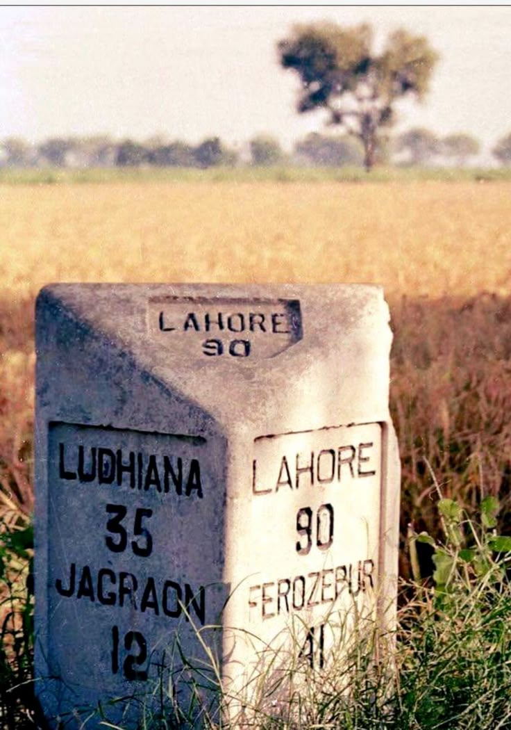 a grave in the middle of a field