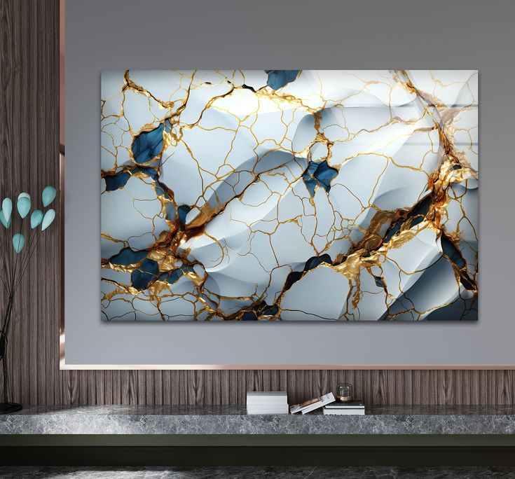 an abstract painting is displayed on the wall above a marbled countertop in a modern bathroom