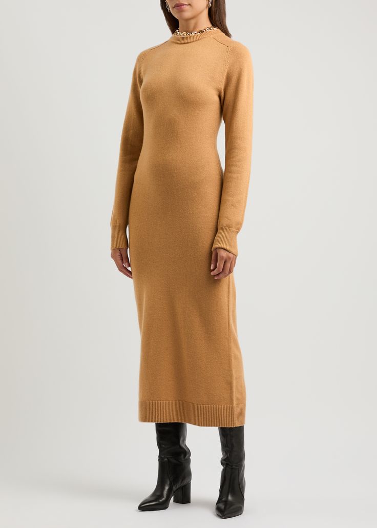 Long Description#Style Notes#Rabanne’s midi dress is crafted from a luxurious blend of wool and cashmere to a slim fit. This long-sleeve style is decorated with the label’s signature nano chain embellishment at the neck that adds a modern flair to the classic jumper dress design. #Info & Care# Rabanne wool-blend midi dress Nano chain embellishment at crew-neck, raglan sleeves, ribbed trims Hook-fastening keyhole at back  70% merino wool, 30% cashmere Hand wash  #Size & Fit# Length shoulder to hem: 49.5 inches/ 126cm Midweight  Slim fit  Model is 5'10"/ 178cm and wears a size FR36 Winter Essentials, Paco Rabanne, Dress Design, Jumper Dress, Raglan Sleeve, Midi Length, Everyday Essentials Products, Sleeve Styles, Merino Wool