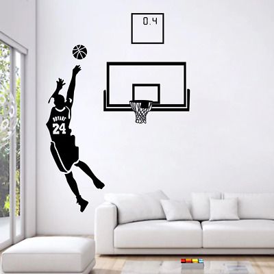 a basketball player dunking the ball into the hoop wall decal in a living room