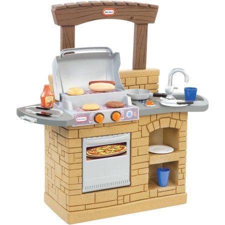 a toy kitchen with an oven and counter top