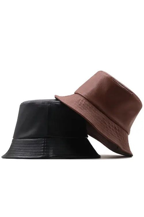 Chic vegan leather bucket hat Casual Leather Hats For Spring, Trendy Adjustable Leather Hat, Trendy Black Leather Hat, Trendy Brown Bucket Hat For Spring, Trendy Leather Hats With Curved Brim, Black Leather Wide Brim Hat, Everyday Brimmed Leather Hats, Casual Brown Bucket Hat For Fall, Black Leather Hat For Fall