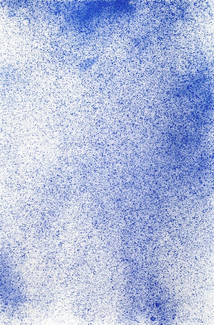 an abstract blue and white background with small speckles