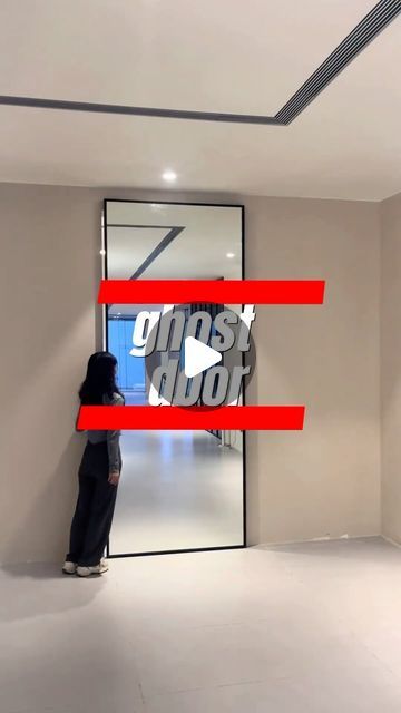 a woman standing in front of a glass door with the words ghost dof on it