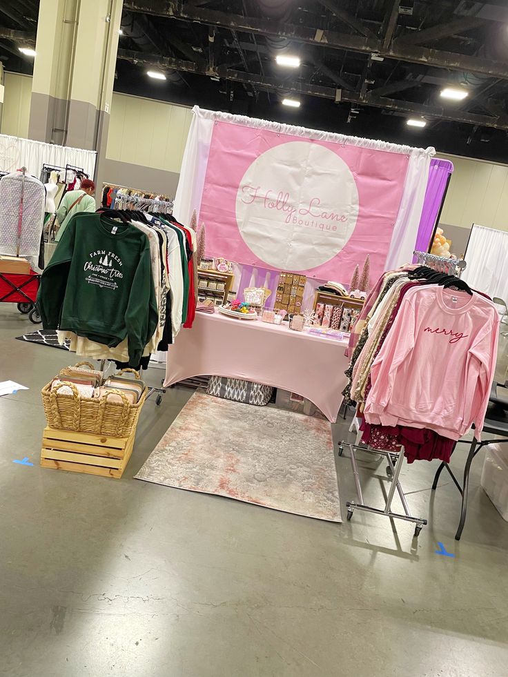 a table with clothing on it in a room