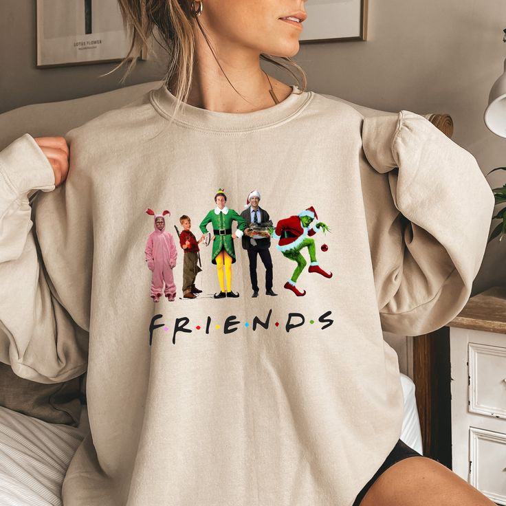 This Friends Christmas Ugly Sweatshirt is a must-have for your winter/Christmas wardrobe. Whether you're attending a Christmas party, staying cozy at home with family and friends, or simply need collecting more sweater-weather crewnecks, this unisex sweatshirt is perfect for you! Our crewnecks are made from the highest quality fabric for an incredibly soft and comfortable fit, with advanced printing and embroidery to ensure that the colors and graphics are vibrant and detailed. ❤ This unisex crewneck sweatshirt is intended to be oversized and loose-fitting for women for a chic and laid-back vibe. If you want something more fitted, we suggest ordering a size down! ❤ How to order your Sweaters: 1. Select the desired Sweater Style/Sweater Color 2. Select the desired Sweater Size 3. Add each s Casual Christmas Cotton Sweatshirt, Casual Cotton Christmas Sweatshirt, Casual Christmas Sweater With Relaxed Fit, Funny Long Sleeve Christmas Tops, Fun Winter T-shirt With Crew Neck, Funny Cotton Winter Sweatshirt, Funny Cotton Sweatshirt For Winter, Casual Christmas Crew Sweatshirt, Casual Christmas Crew Neck Sweatshirt