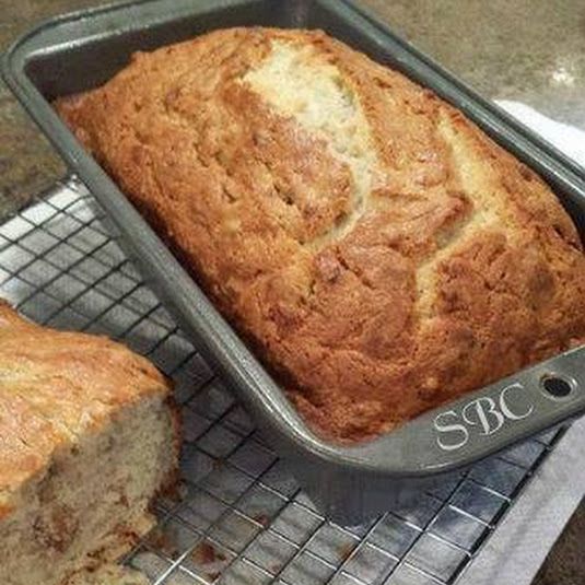 a loaf of bread sitting on top of a cooling rack