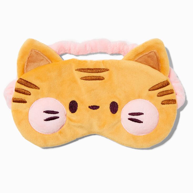 a yellow cat sleep mask with pink ears