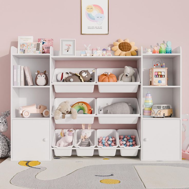 a white shelf filled with lots of toys and stuffed animals next to a pink wall