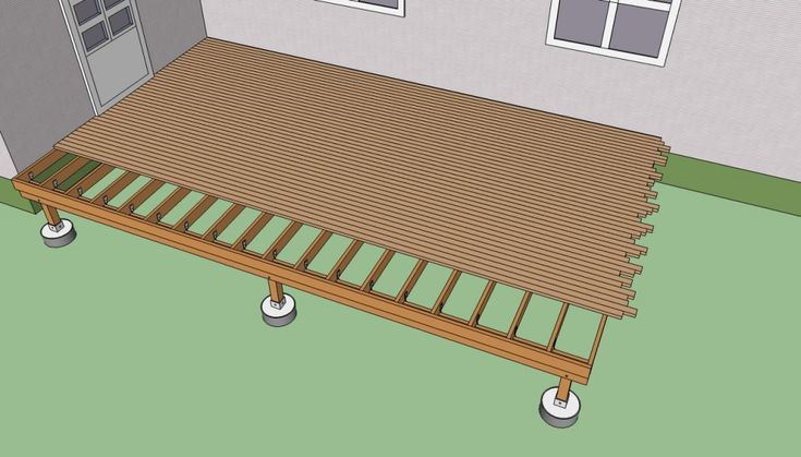 a wooden deck with wheels attached to it