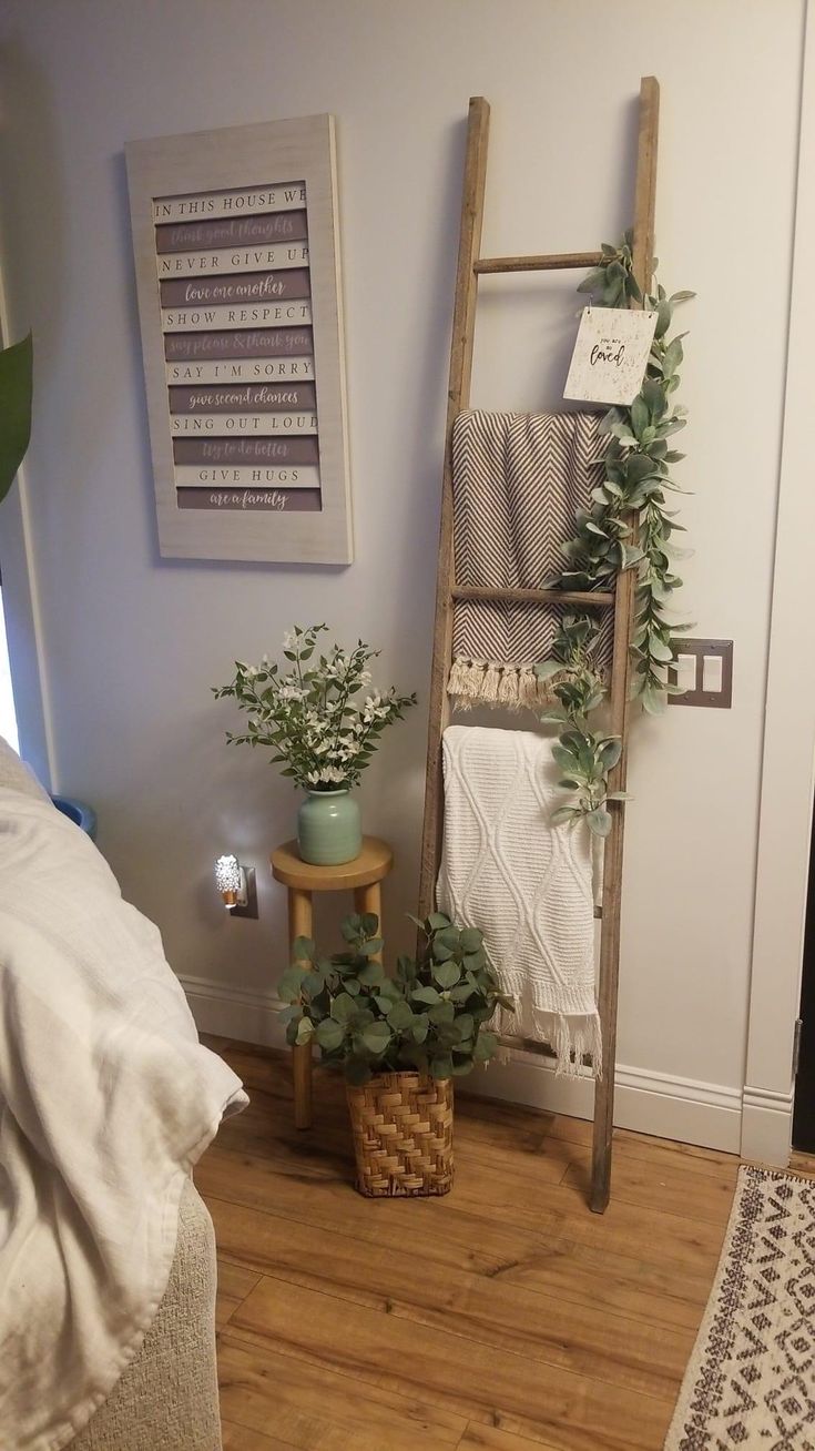 a ladder leaning against the wall in a bedroom