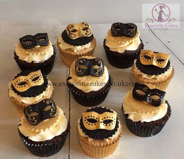 cupcakes with masquerade masks on them