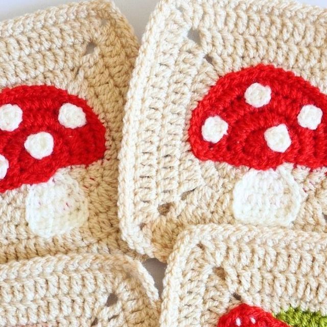 crocheted dishcloths with red mushrooms on them