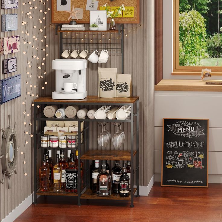 a kitchen with wooden floors and shelves filled with food, drinks and condiments