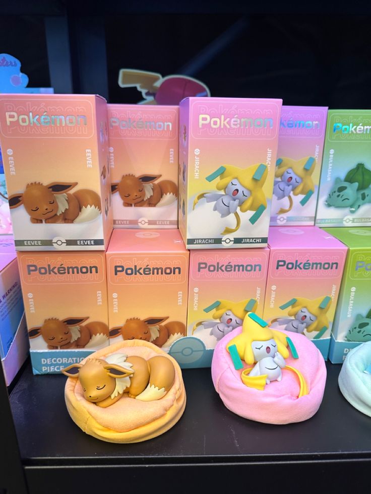 some pokemon toys are on display for sale